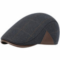 Gorra plana talla única de tejido gris oscuro y marrón con diseño espiga